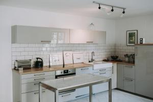 Virtuvė arba virtuvėlė apgyvendinimo įstaigoje Die Backstube