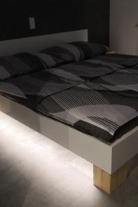 Postel nebo postele na pokoji v ubytování Apartmán Luční NMNM