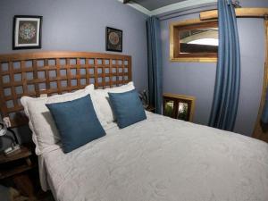 Postel nebo postele na pokoji v ubytování Hotel Hacienda Don Paolo