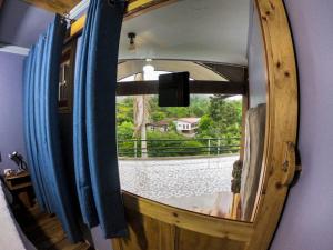 TV a/nebo společenská místnost v ubytování Hotel Hacienda Don Paolo