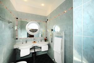 Koupelna v ubytování Hotel Vienna