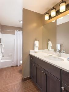 a bathroom with a sink and a toilet and a tub at WorldMark McCall in McCall