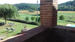 a view of a field from a house at Agriturismo Podere Valdilucciole in Città della Pieve