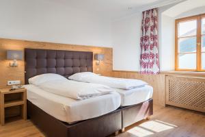 Voodi või voodid majutusasutuse Hotel Plankenhof B&B toas