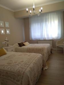 Posteľ alebo postele v izbe v ubytovaní Torre Center II