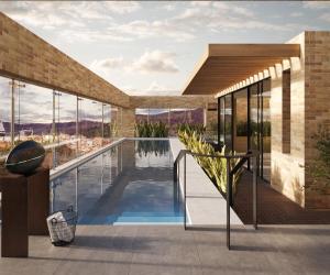a house with a swimming pool with a view at Cassa Luxury Homes in Bogotá