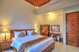 Posteľ alebo postele v izbe v ubytovaní Arya Resort Nusa Penida