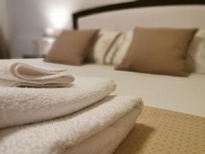 Postel nebo postele na pokoji v ubytování Eschilo Luxury House