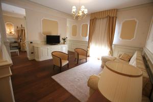 Sjónvarps- og/eða afþreyingartæki á Hotel Borgo Don Chisciotte