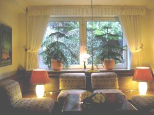 A seating area at Hotel Maromme