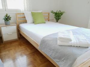 Postel nebo postele na pokoji v ubytování Spacious 110m2 2bedrooms 2bathrooms Center Athens