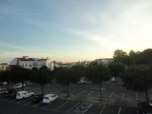 a view of a parking lot with cars parked at Lena's Home in Ponta Delgada