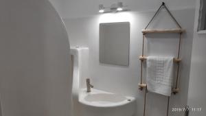 Kúpeľňa v ubytovaní Grey Rooms Naxos