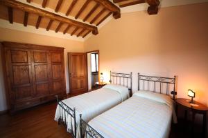 Cama o camas de una habitación en Villetta Caprili