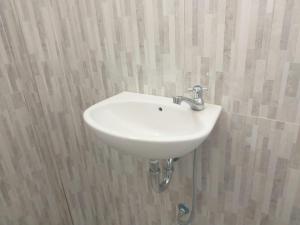 Koupelna v ubytování Yuda Homestay