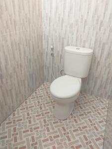 Koupelna v ubytování Yuda Homestay