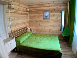 Postel nebo postele na pokoji v ubytování Aquamarine