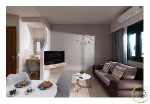 A television and/or entertainment centre at Irini Apartment Piskopiano, Hersonissos #2