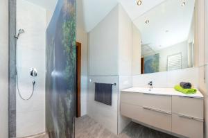 A bathroom at ArtiHome Még 37 kép