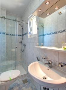 Koupelna v ubytování Motel MontaNaro + 33 fotografií