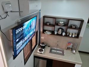 Kuchyň nebo kuchyňský kout v ubytování Clark-Pad Inn, Angeles City