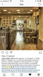 ラパッロにあるCasa Giulioのテーブルと椅子が備わるレストラン