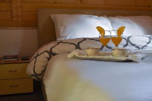 Postel nebo postele na pokoji v ubytování TARA INN Resort