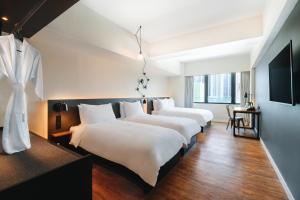 Pentahotel Hong Kong, Tuen Mun客房内的一张或多张床位
