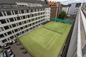 an overhead view of a tennis court on a building at ProfilHotels Mercur in Copenhagen