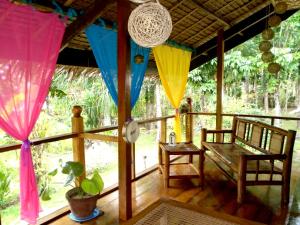 Taman di luar Nypa Style Resort Camiguin
