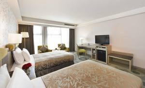 Postel nebo postele na pokoji v ubytování Fullon Hotel Kaohsiung