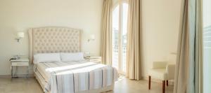 Postel nebo postele na pokoji v ubytování Hotel Atlántico