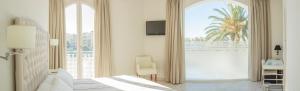 TV a/nebo společenská místnost v ubytování Hotel Atlántico