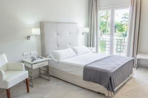 Postel nebo postele na pokoji v ubytování Hotel Atlántico + 37 fotografií