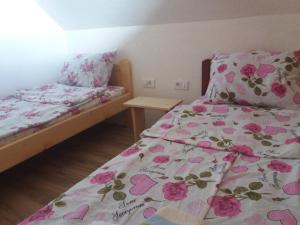 Postel nebo postele na pokoji v ubytování Guest House Vukicevic
