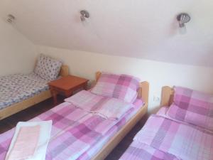 Postel nebo postele na pokoji v ubytování Guest House Vukicevic