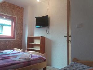 Postel nebo postele na pokoji v ubytování Guest House Vukicevic