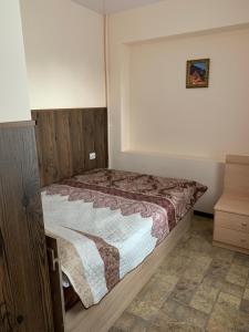 Ένα ή περισσότερα κρεβάτια σε δωμάτιο στο Гостиница GOBI