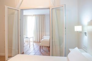 Postel nebo postele na pokoji v ubytování Hotel Atlántico