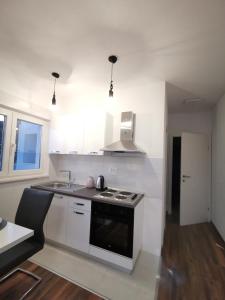 Kuchyňa alebo kuchynka v ubytovaní Charming studio - apartment