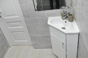 Koupelna v ubytování MEDELEAN HOTEL