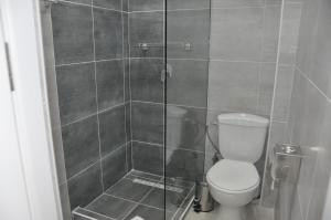 Koupelna v ubytování MEDELEAN HOTEL