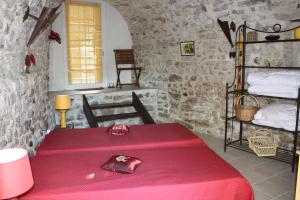 Krevet ili kreveti u jedinici u objektu gîte jaune Ardèche L'Avventura