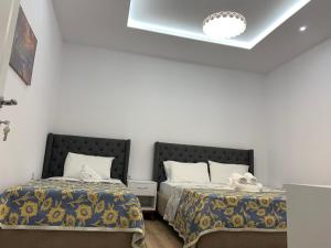 Postel nebo postele na pokoji v ubytování Hotel Jurgen