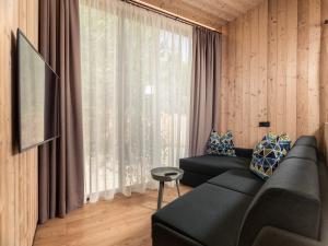 Posedenie v ubytovaní Skyview Chalets am Camping Toblacher See