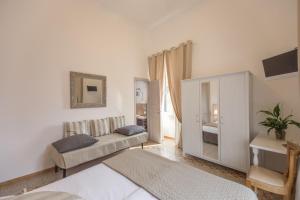 Voodi või voodid majutusasutuse Biancorèroma B&B toas
