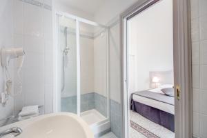 Vannituba majutusasutuses Biancorèroma B&B