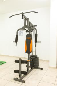 an exercise bike in a gymnasium at Oceania Bay Village in Pyla