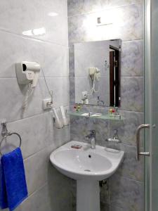 Ett badrum på A-Hotel Ex Magistral
