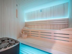 a sauna with a wooden tub in a room at Villa Minimal by Interhome in Kastav